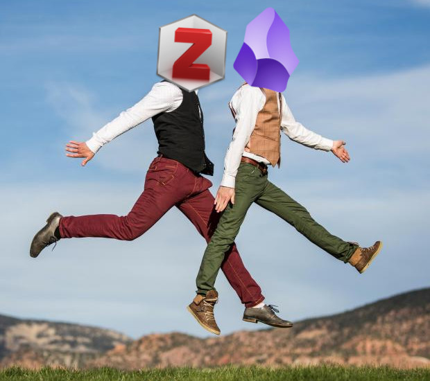 A picture showing two men jumping together over a green field. Instead of heads they have the Zotero and Obsidian logo respectively.